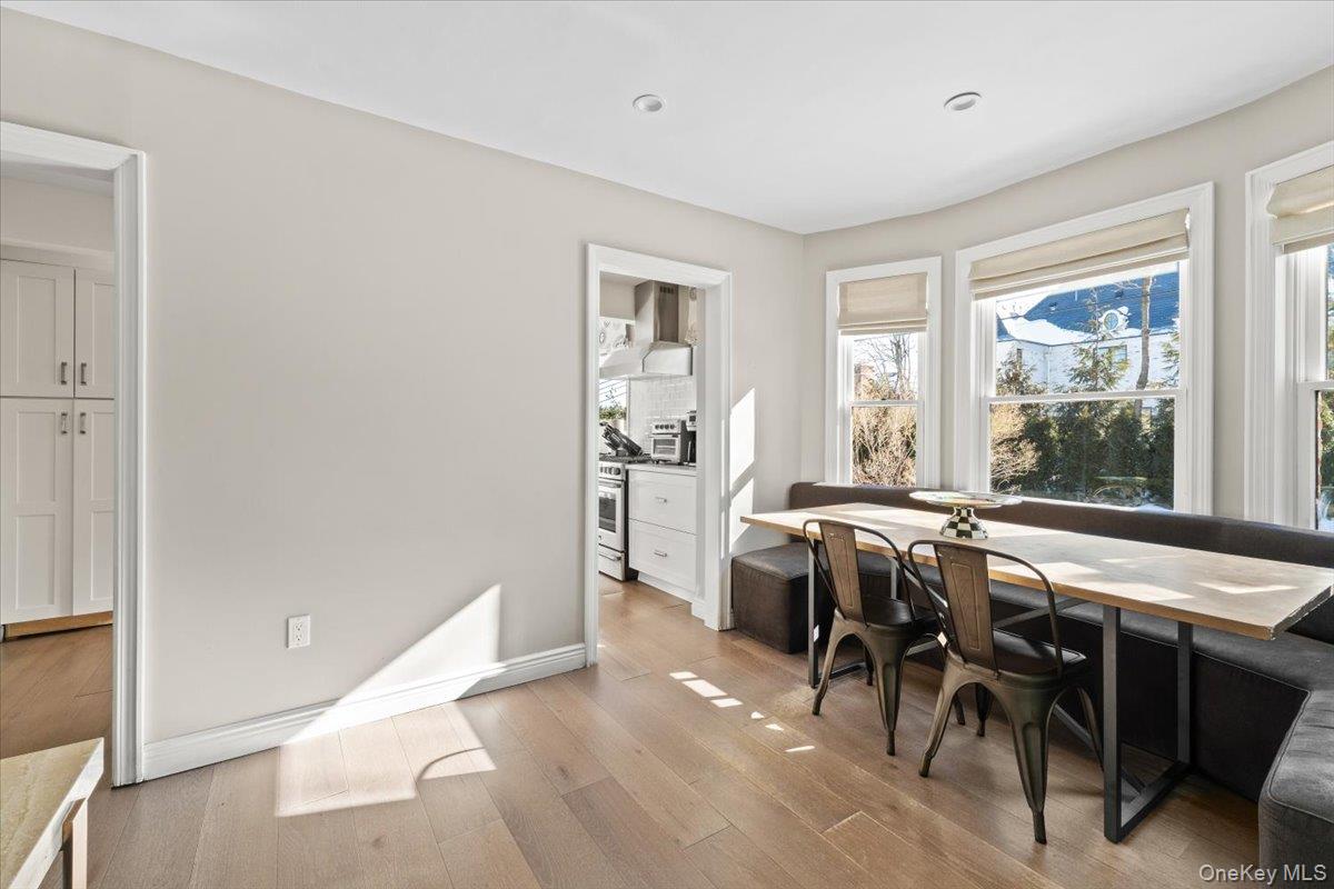 25 Pond Park Road Great Neck, NY 11023 - Photo 21 of 45 a view of a dining room with furniture and window