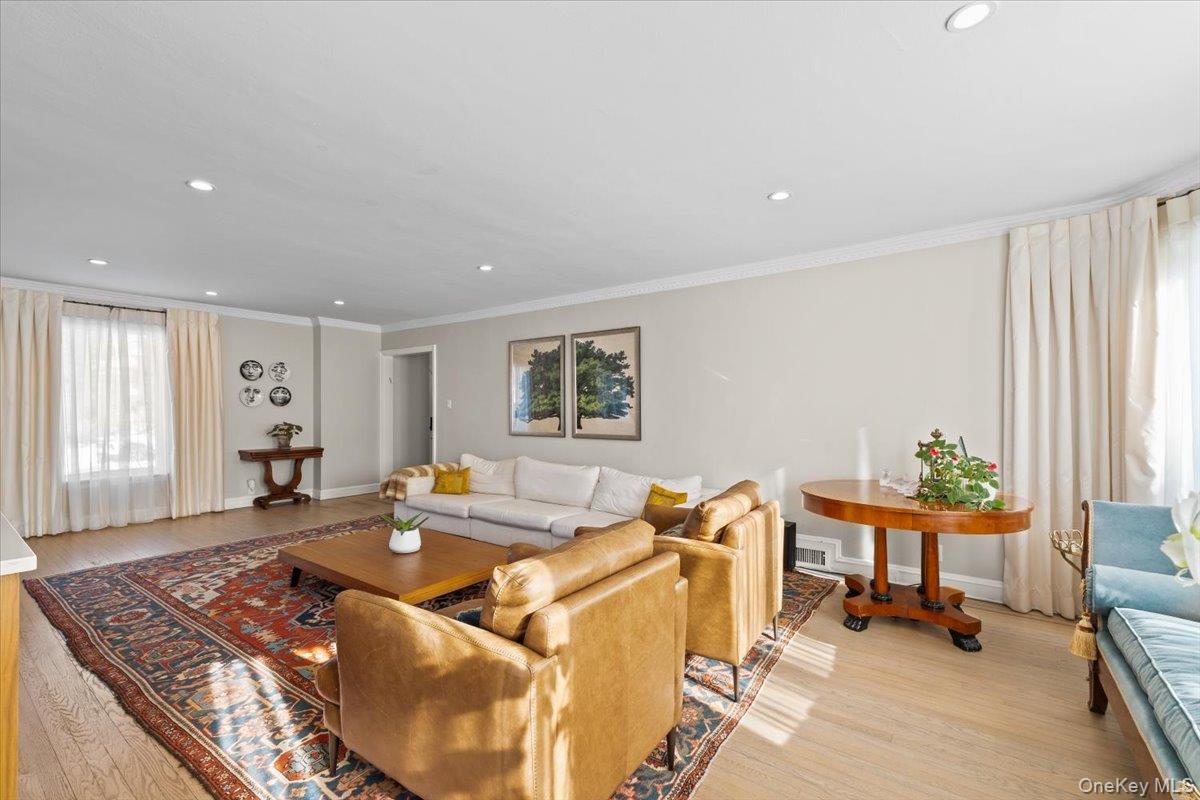 25 Pond Park Road Great Neck, NY 11023 - Photo 6 of 45 a living room with furniture and a window