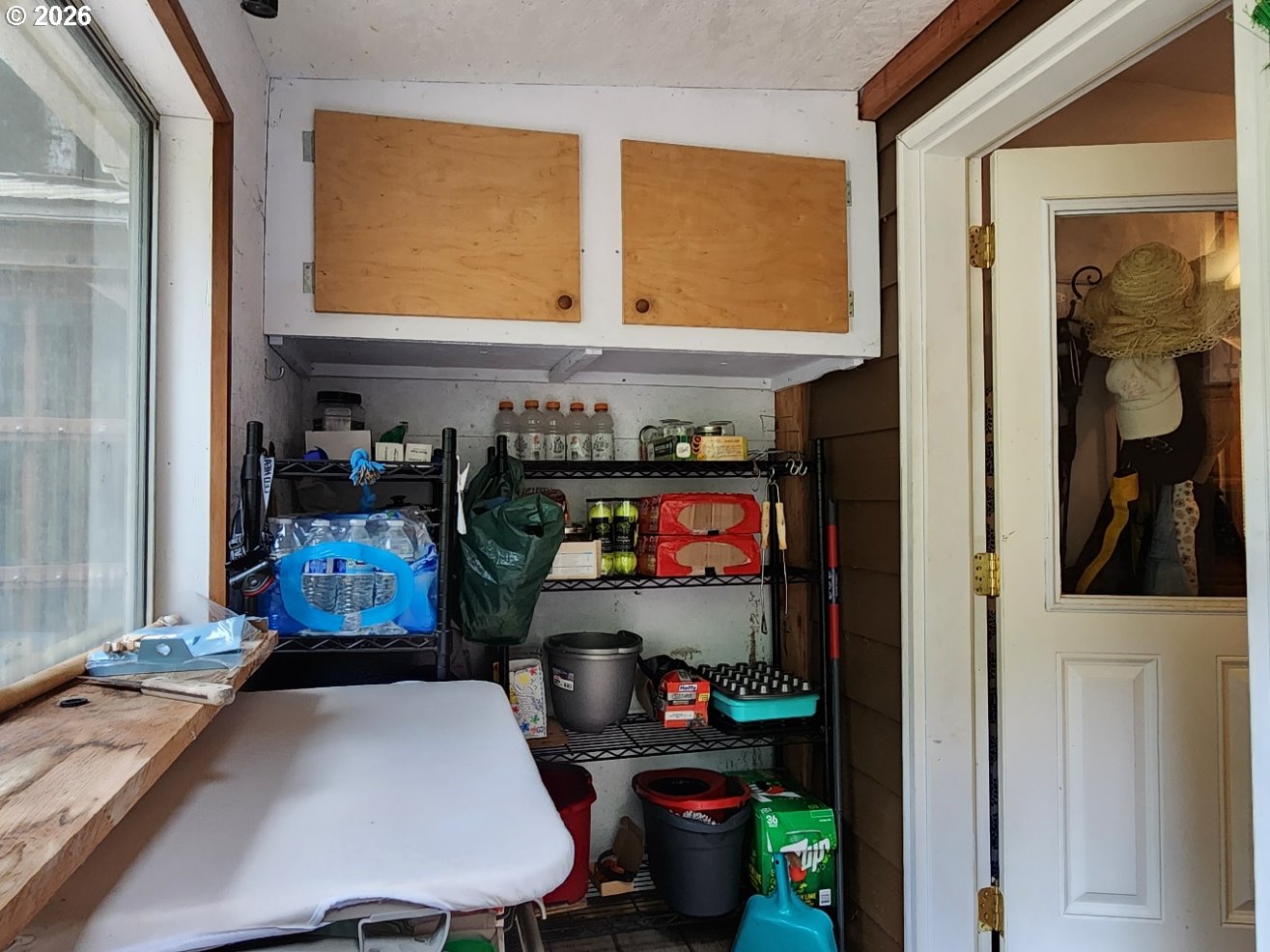 93490 Fir Road Port Orford, OR 97465 - Photo 25 of 47 a room with furniture and a window