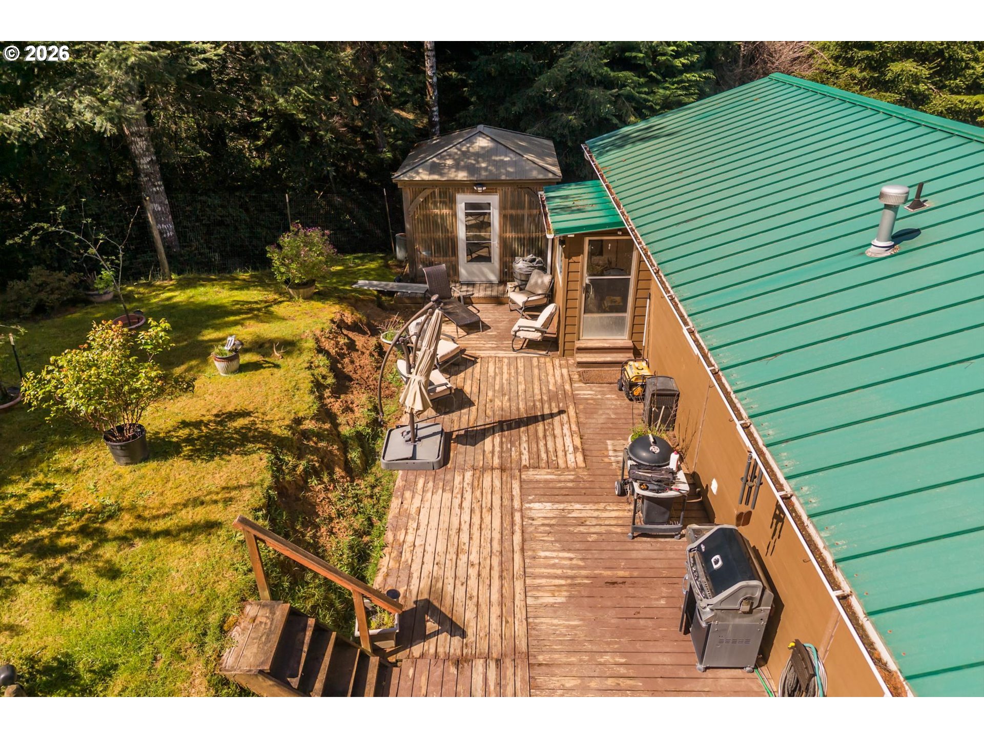 93490 Fir Road Port Orford, OR 97465 - Photo 37 of 47 a aerial view of a house with a yard