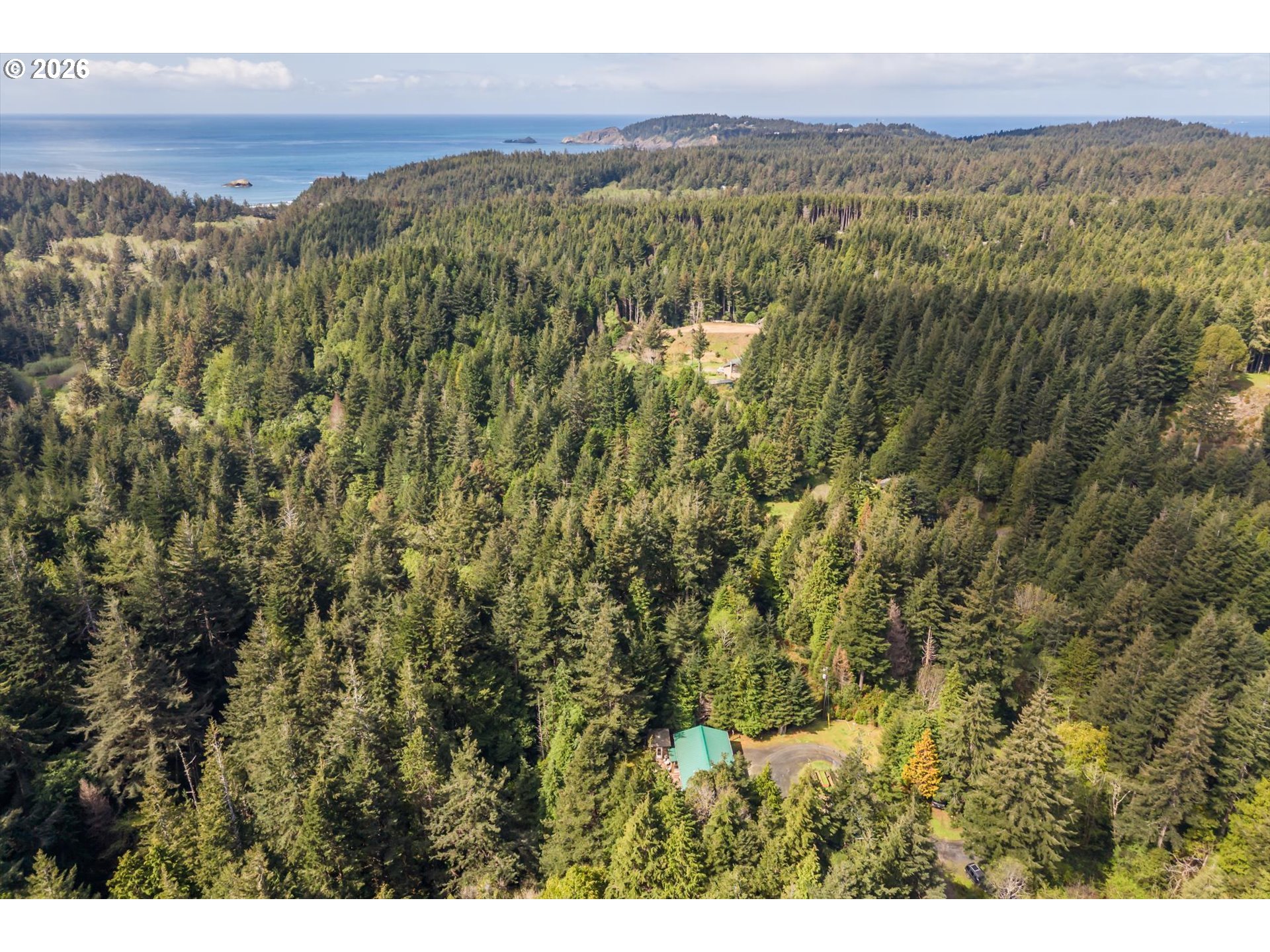 93490 Fir Road Port Orford, OR 97465 - Photo 41 of 47 a view of a city with mountain