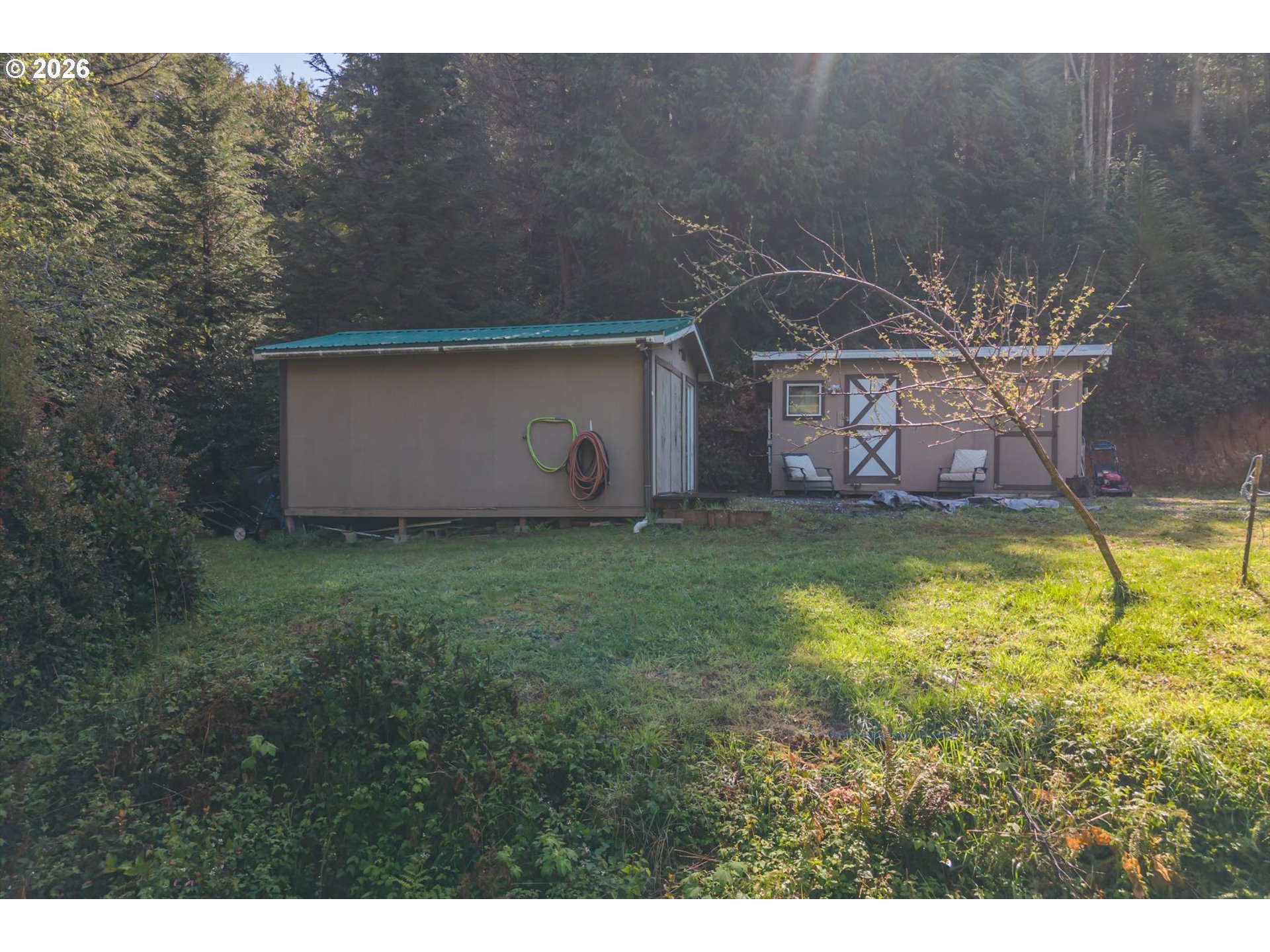93490 Fir Road Port Orford, OR 97465 - Photo 43 of 47 a view of a yard in front of the house