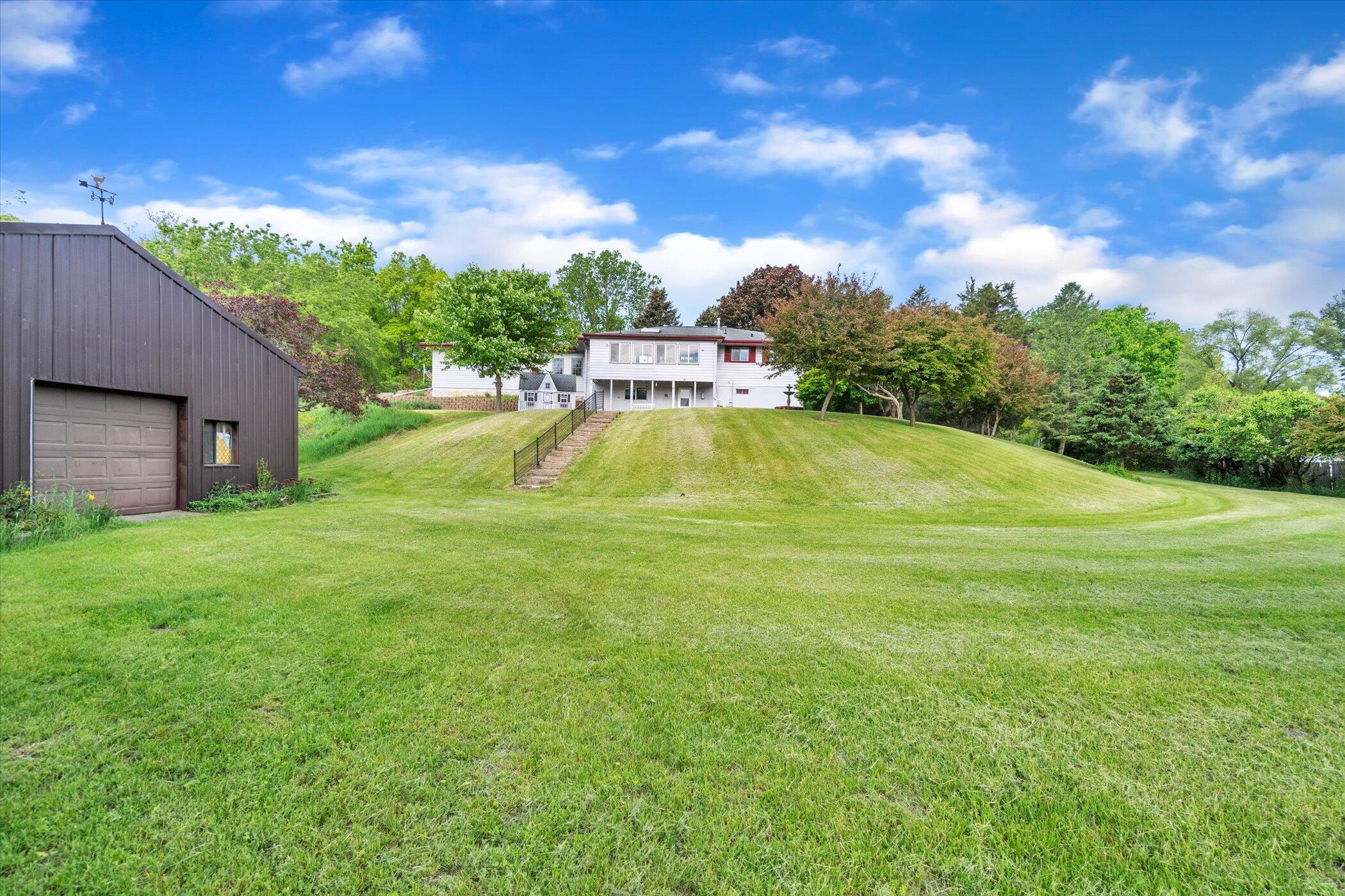 5673 Ackerson Lake Road Jackson, MI 49201 - Photo 47 of 55 49-5673-Ackerson-Lake-Rd-WindowStill-Rea