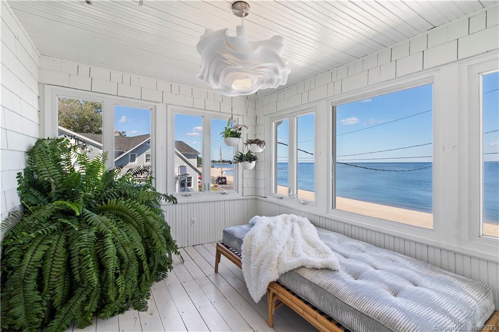 19 Soundview Drive Westport, CT 06880 - Photo 11 of 40 a living room with furniture and a large window