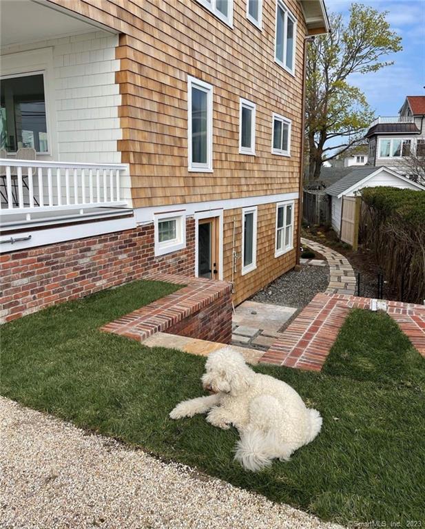 19 Soundview Drive Westport, CT 06880 - Photo 30 of 40 a view of a house with a yard