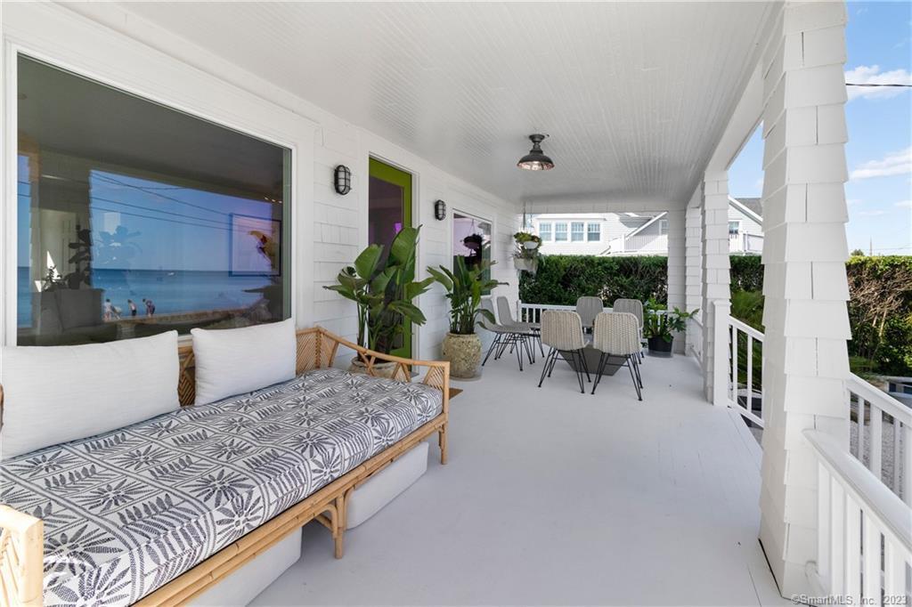 19 Soundview Drive Westport, CT 06880 - Photo 32 of 40 a living room with furniture and a potted plant