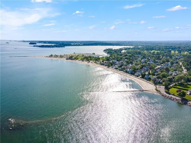 an aerial view of beach and ocean
