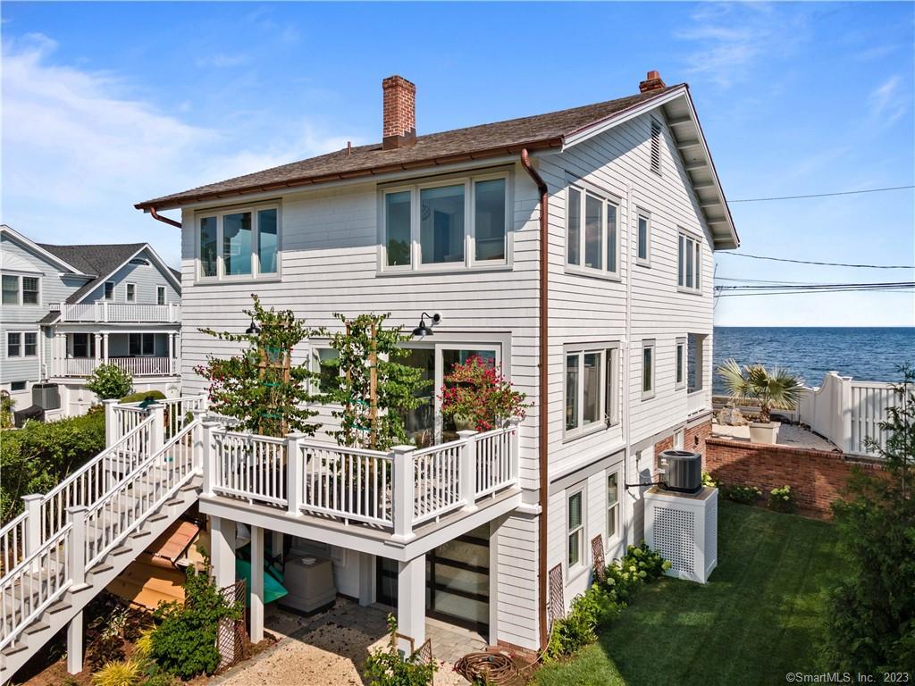 19 Soundview Drive Westport, CT 06880 - Photo 35 of 40 a front view of a house with a deck