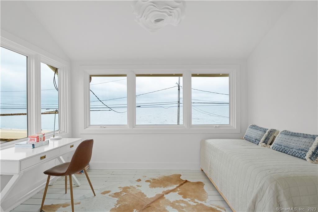 19 Soundview Drive Westport, CT 06880 - Photo 40 of 40 a bedroom with a bed chair and window
