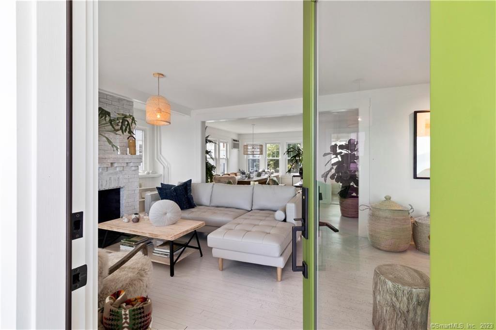 19 Soundview Drive Westport, CT 06880 - Photo 6 of 40 a living room with furniture and a table