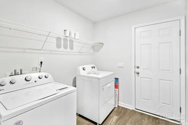 a utility room with dryer and washer