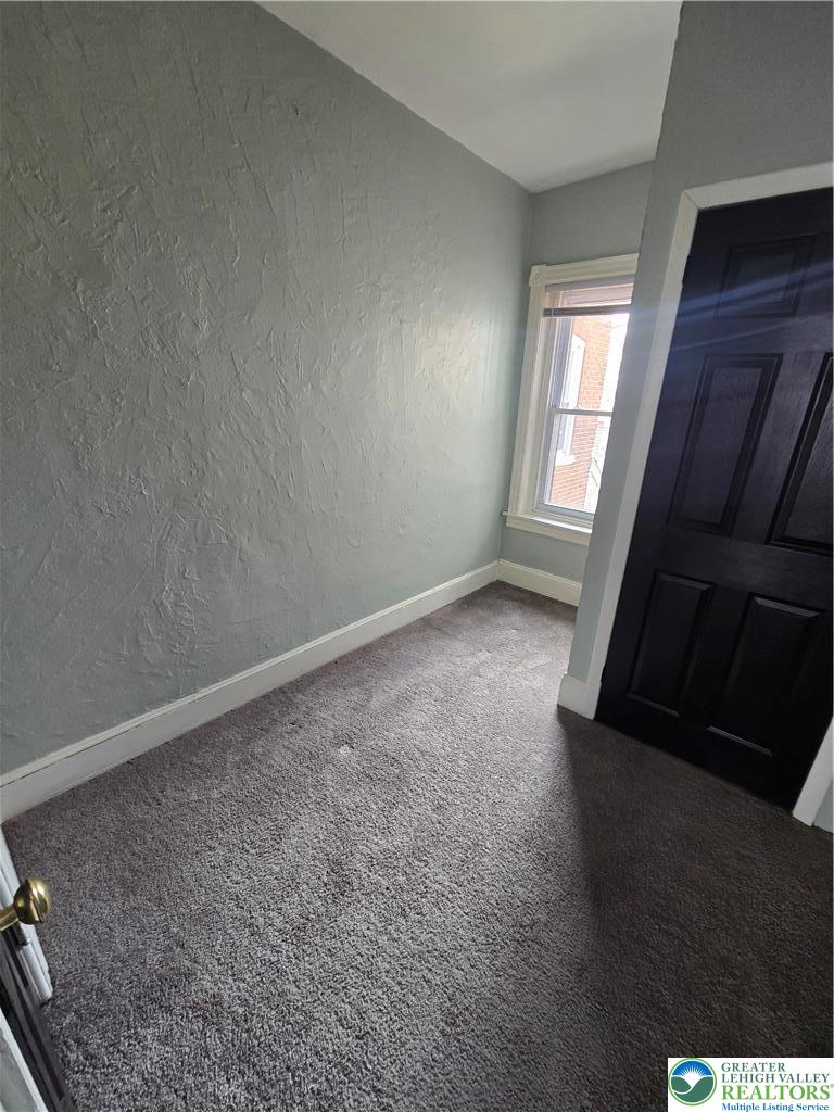 535 Pine Street Bethlehem, PA 18018 - Photo 6 of 11 an empty room with windows