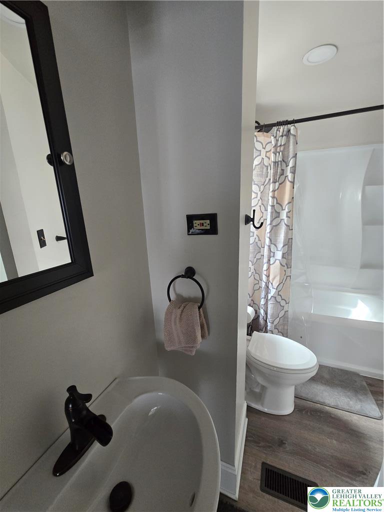 535 Pine Street Bethlehem, PA 18018 - Photo 7 of 11 a bathroom with a sink toilet and shower