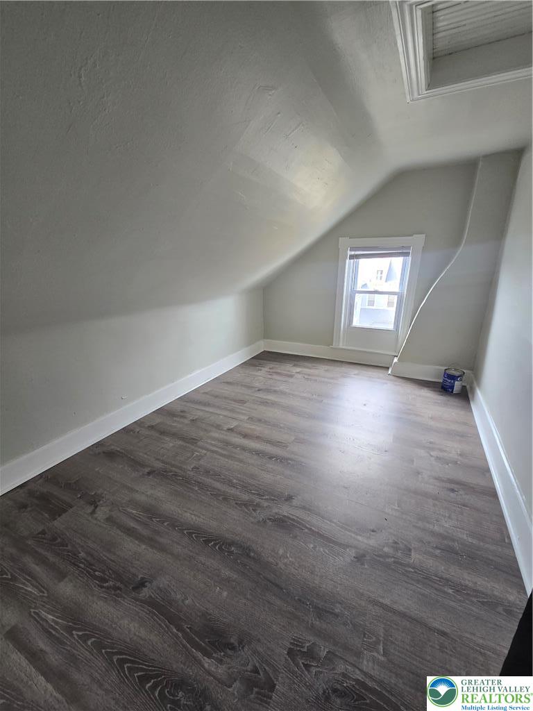 535 Pine Street Bethlehem, PA 18018 - Photo 9 of 11 an empty room with wooden floor and windows