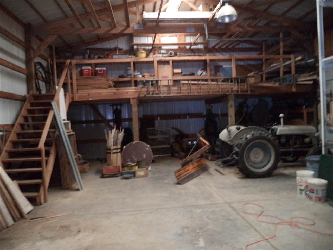14105 Rowley Road Durand, IL 61024 - Photo 11 of 24 a view of a storage room with washer and dryer
