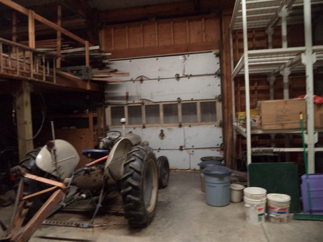 14105 Rowley Road Durand, IL 61024 - Photo 14 of 24 a building outdoor space with patio furniture and potted plants