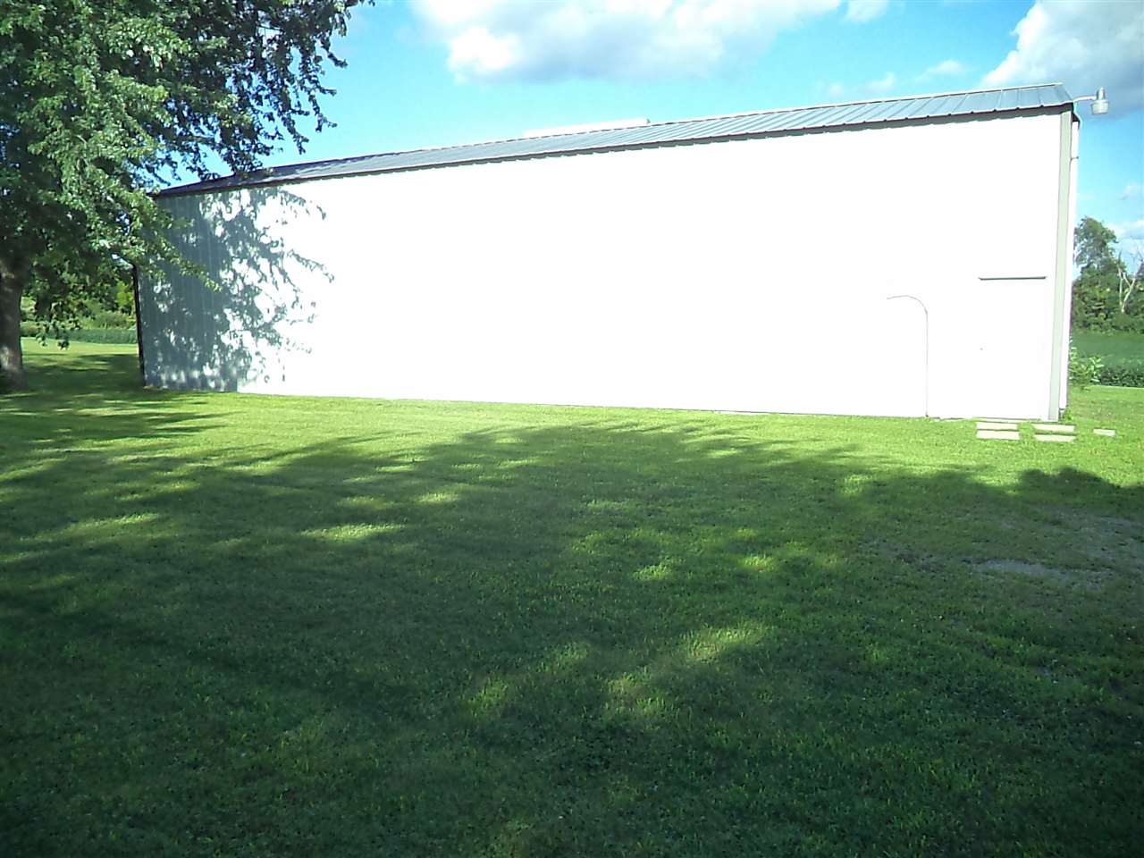 14105 Rowley Road Durand, IL 61024 - Photo 6 of 24 a view of a big yard with large trees