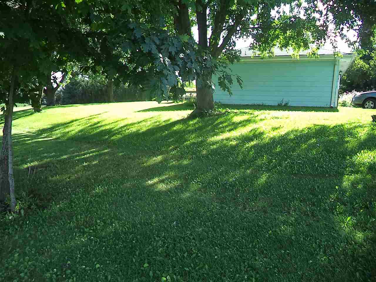 14105 Rowley Road Durand, IL 61024 - Photo 7 of 24 a view of swimming pool with a yard
