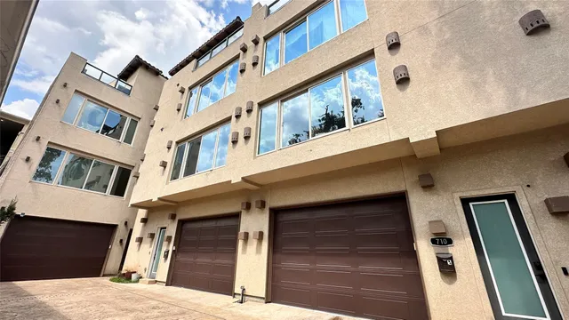 a view of a building with a door and windows