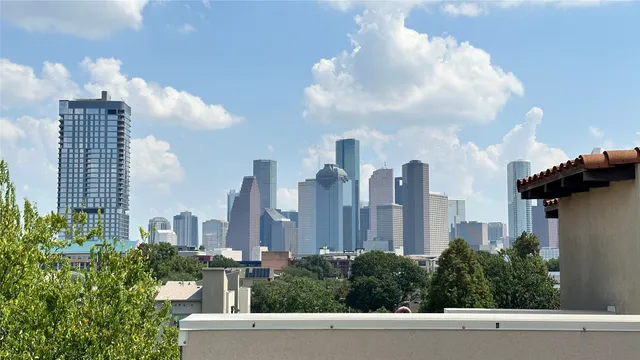 a view of a city with tall buildings
