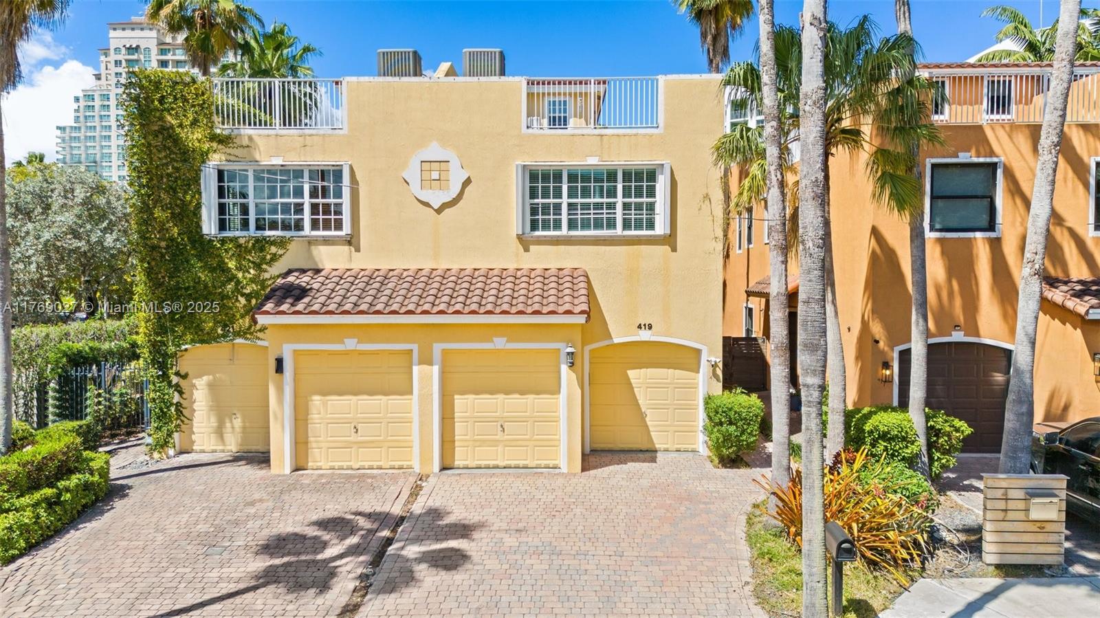 419 Southwest 5th Street, Unit 419 Fort Lauderdale, FL 33315 - Photo 1 of 44 a front view of a multi story residential apartment building