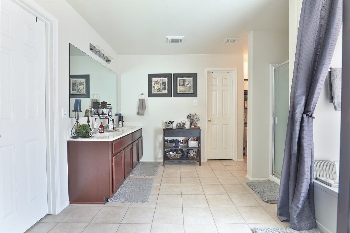 21711 Cascade Hollow Lane Spring, TX 77379 - Photo 14 of 24 a room with kitchen island table and chairs