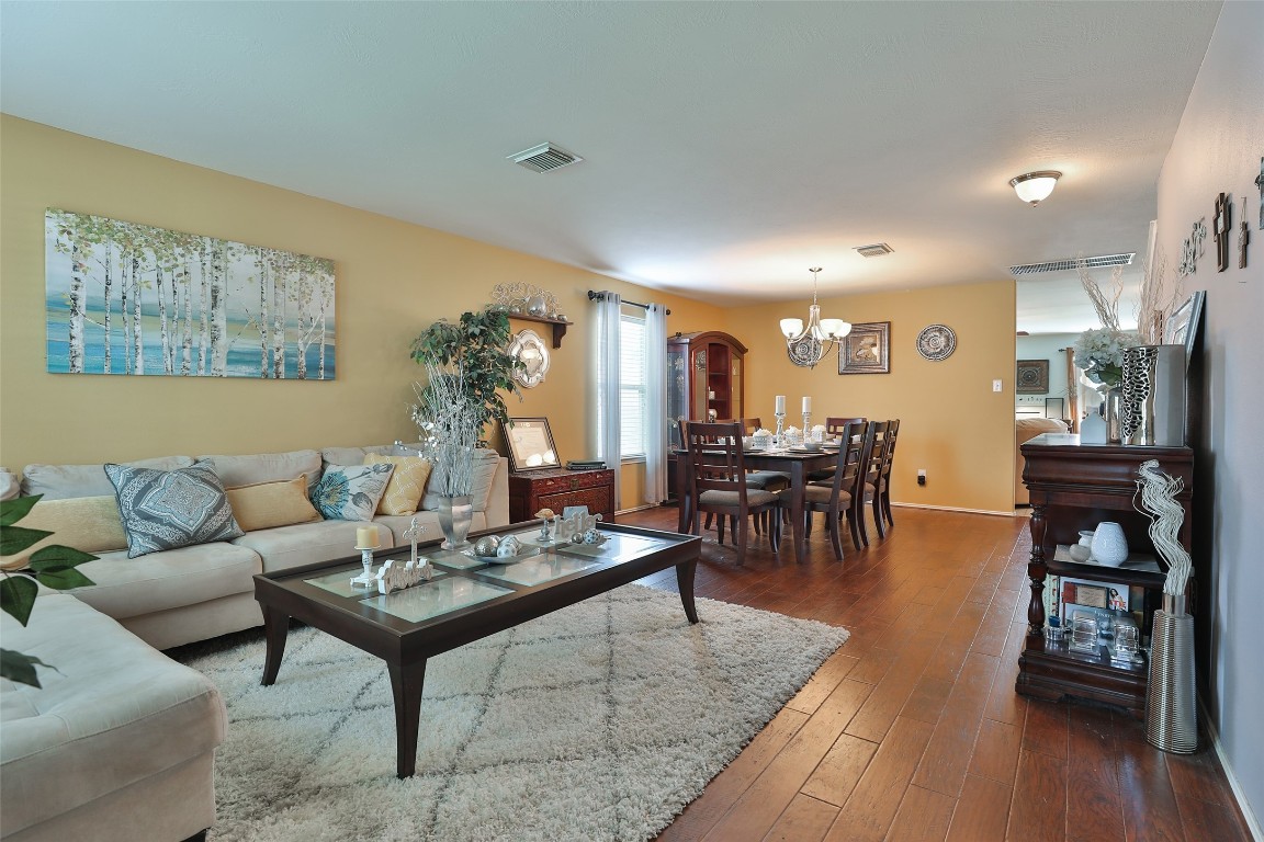 21711 Cascade Hollow Lane Spring, TX 77379 - Photo 2 of 24 a living room with furniture and wooden floor