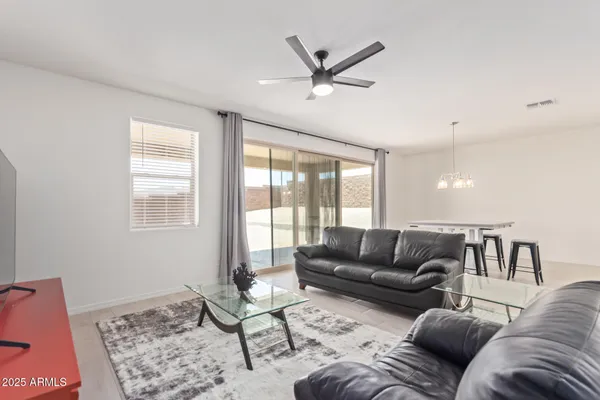 a living room with furniture and a window