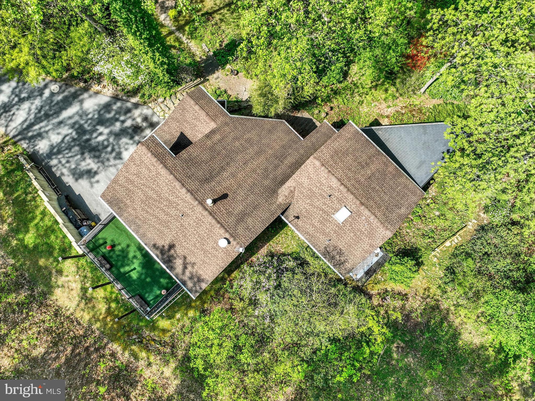 127 Halls Road Red Lion, PA 17356 - Photo 2 of 133 an aerial view of a house with a yard and large trees