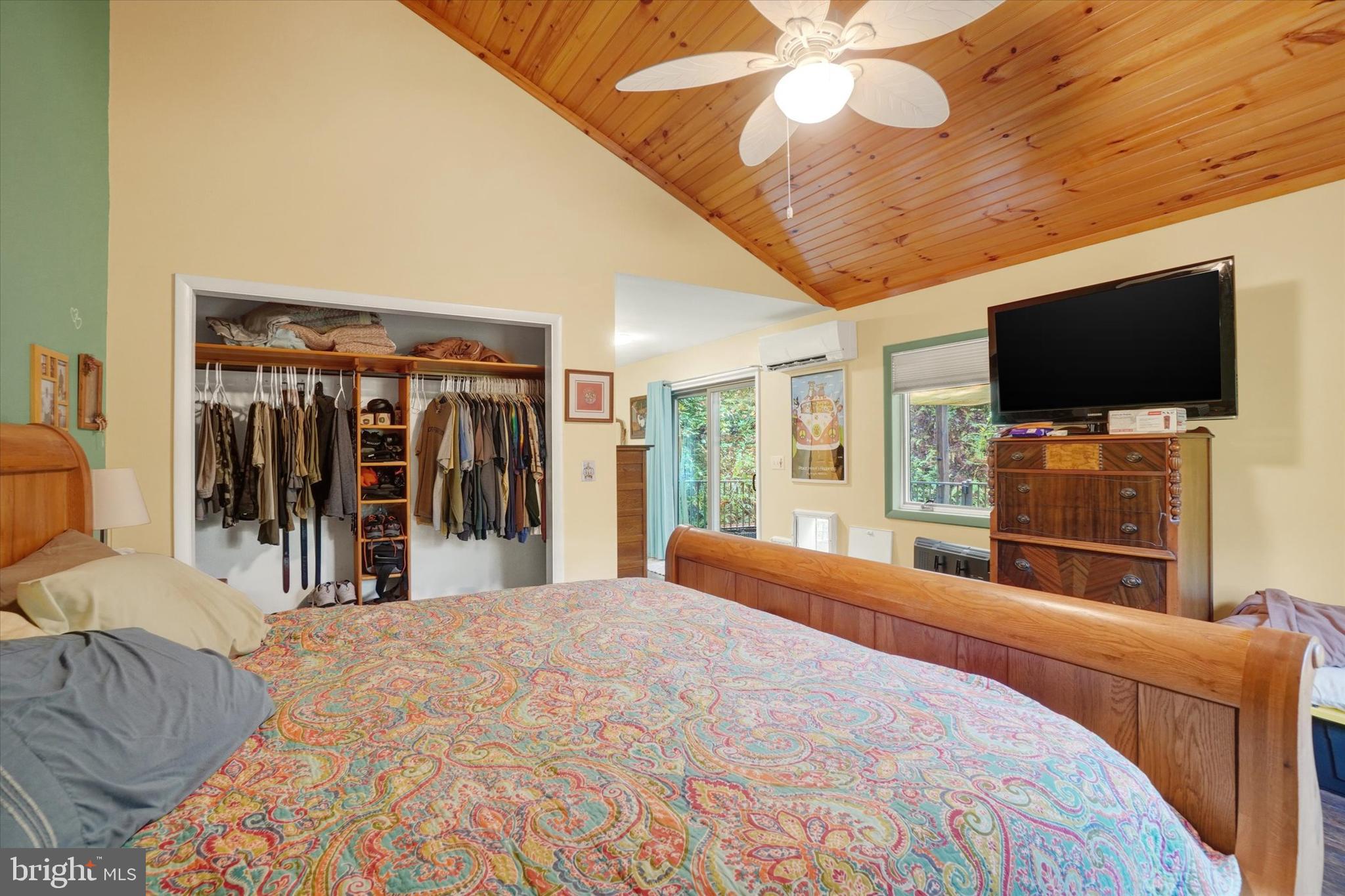 127 Halls Road Red Lion, PA 17356 - Photo 28 of 133 a bedroom with a bed and a flat screen tv
