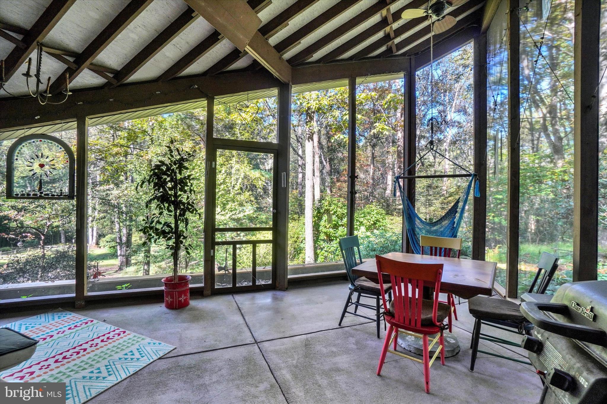 127 Halls Road Red Lion, PA 17356 - Photo 32 of 133 a view of a patio with a table chairs and a backyard