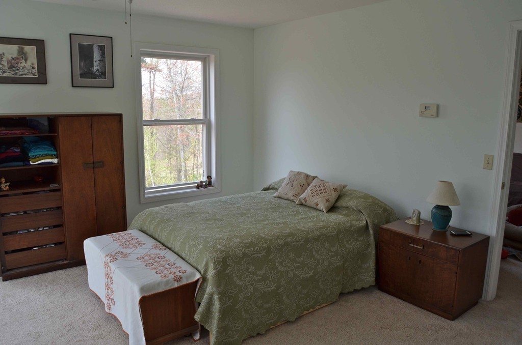 407 South Gulf Road Belchertown, MA 01007 - Photo 17 of 30 a bedroom with a bed and a window