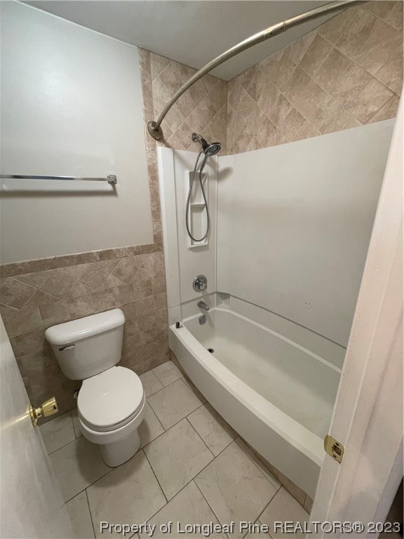 3308 Arrowhead Road Spring Lake, NC 28390 - Photo 13 of 13 a bathroom with a toilet and a shower