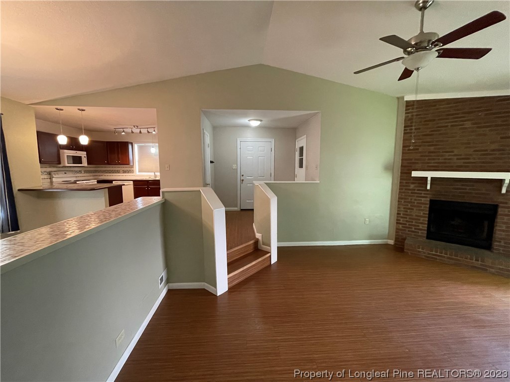 3308 Arrowhead Road Spring Lake, NC 28390 - Photo 6 of 13 a view of a livingroom with furniture and a fireplace