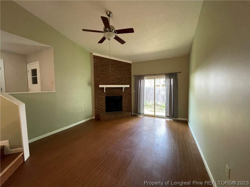 3308 Arrowhead Road Spring Lake, NC 28390 - Photo 7 of 13 a view of empty room with wooden floor and fan