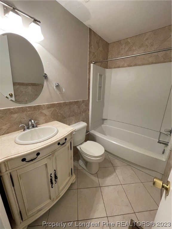 3308 Arrowhead Road Spring Lake, NC 28390 - Photo 8 of 13 a bathroom with a sink a toilet and shower