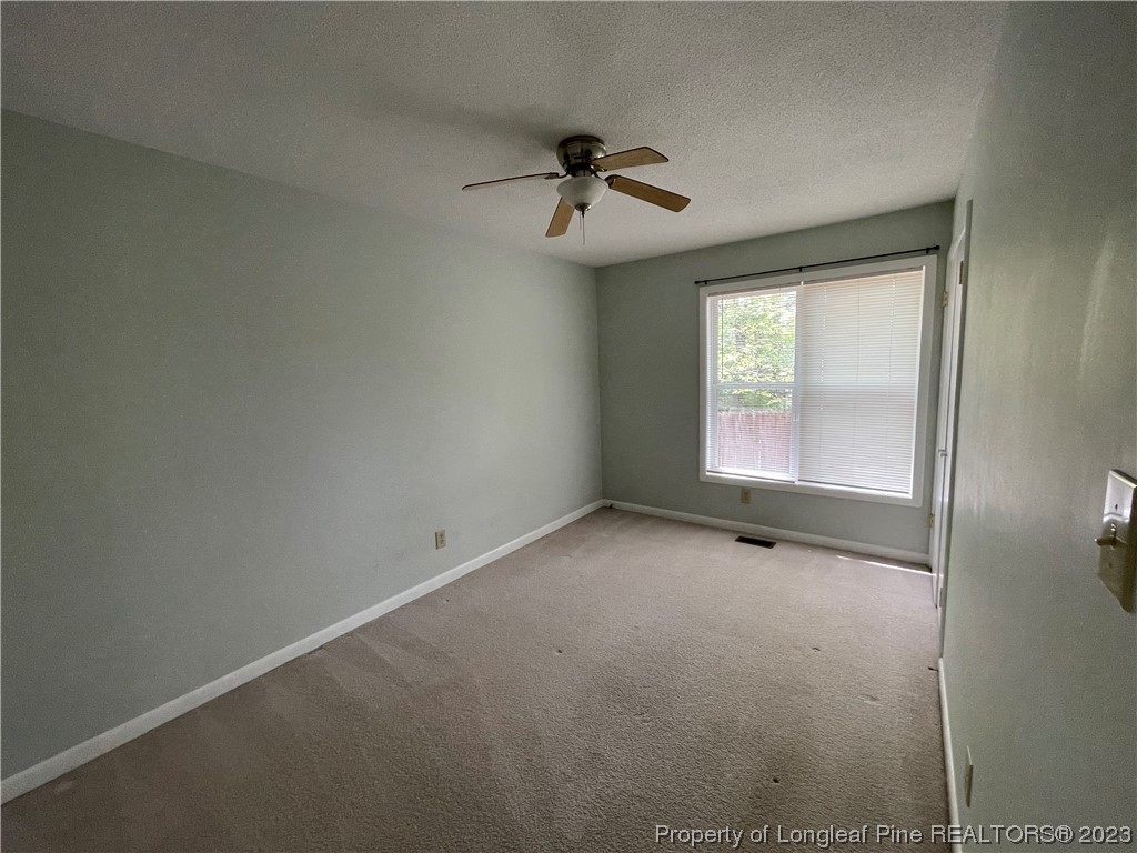 3308 Arrowhead Road Spring Lake, NC 28390 - Photo 9 of 13 an empty room with windows