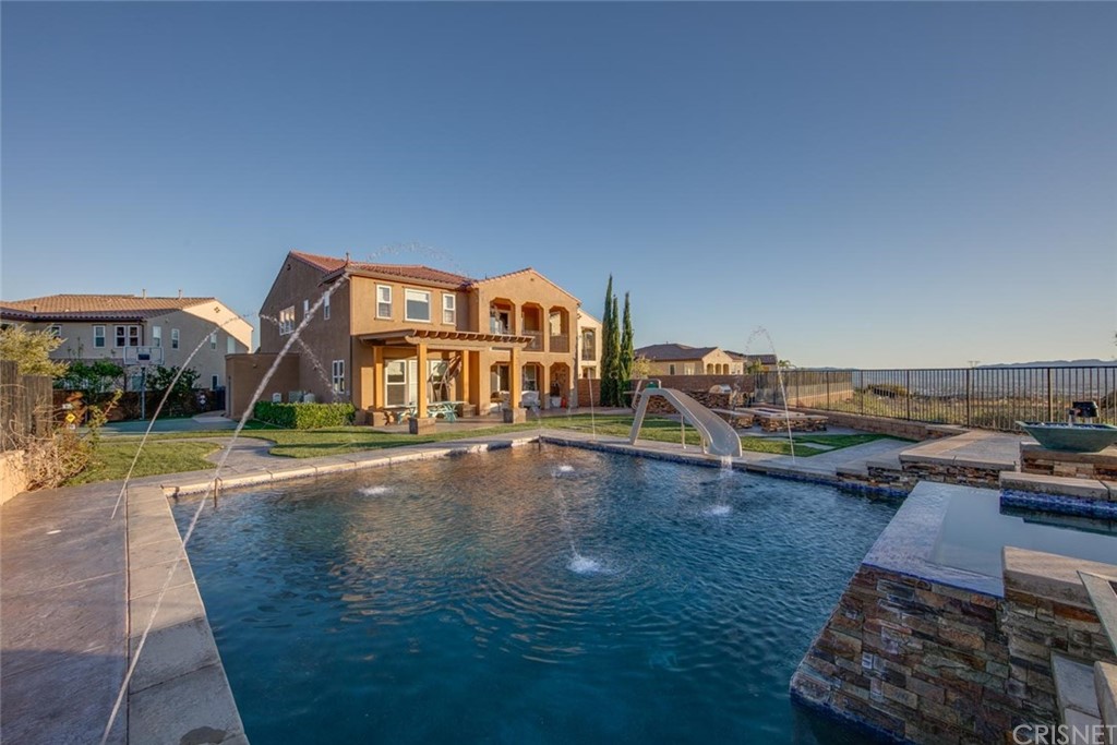 20855 Piazza Way Porter Ranch, CA 91326 - Photo 31 of 38 an outdoor space with pool and furniture