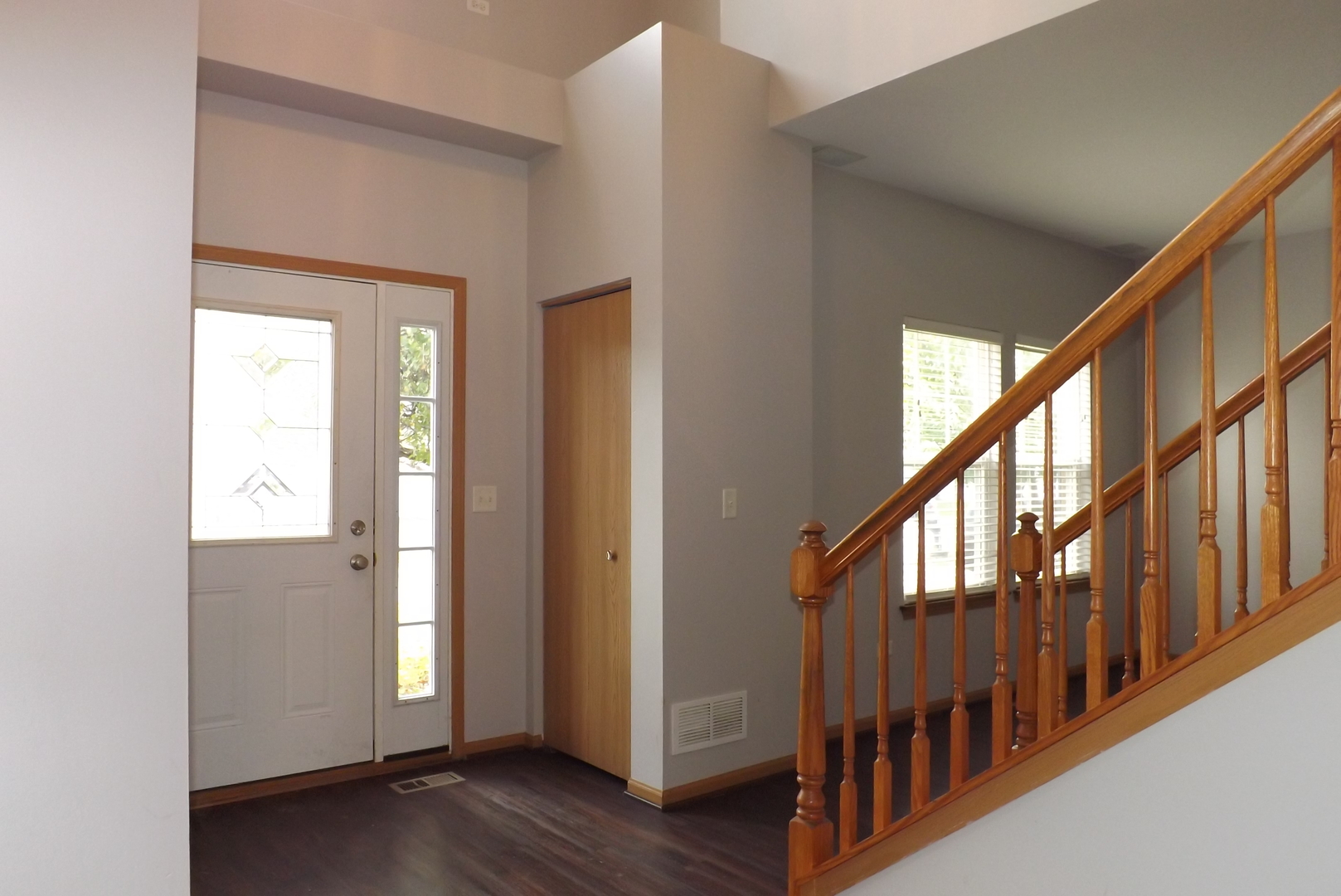 1865 Cattail Circle Aurora, IL 60504 - Photo 2 of 14 a view of an entryway with wooden floor
