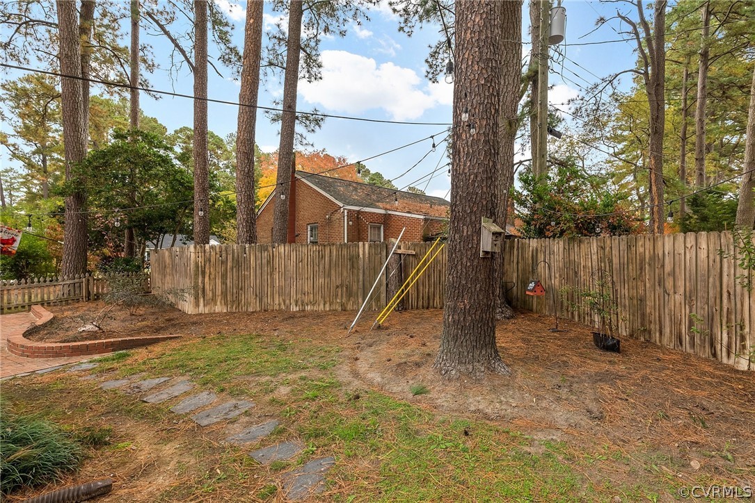935 Hampton Road Petersburg, VA 23805 - Photo 48 of 49 Side yard with plenty of lawn for pet or play