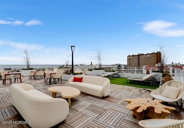 215 2nd Avenue, Unit 106 Asbury Park, NJ 07712 - Photo 20 of 24 a view of a terrace with furniture
