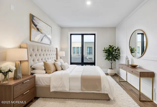 a bedroom with a large bed and a window