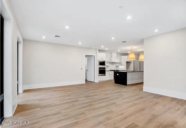 a view of kitchen dining table and cabinets