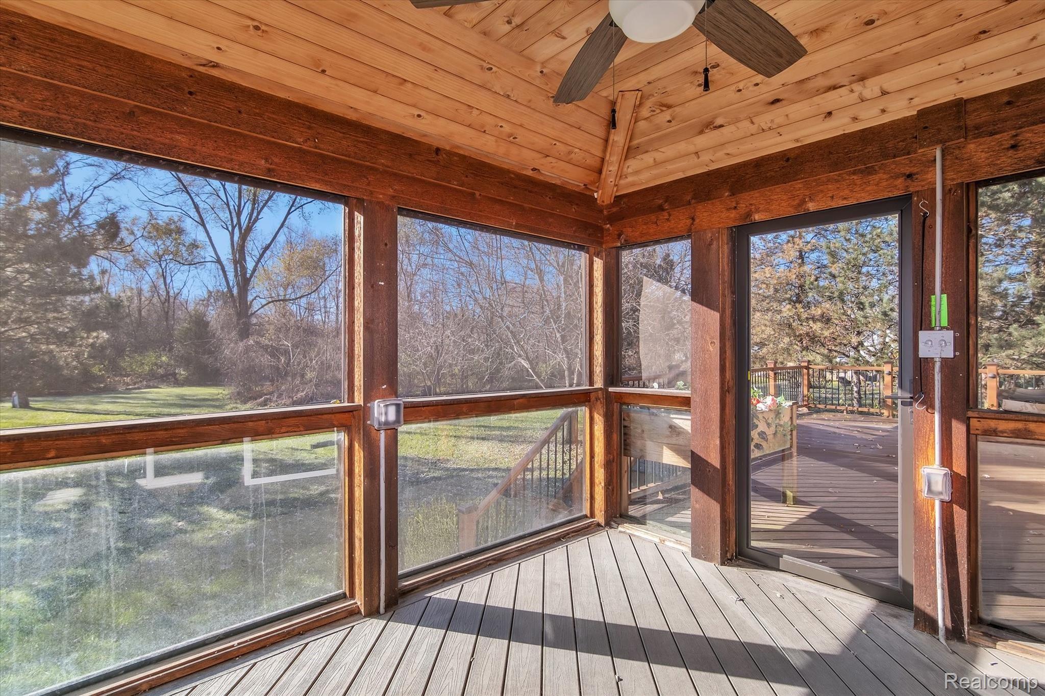 47111 Hull Road Belleville, MI 48111 - Photo 36 of 46 Relax in your enclosed screen room!