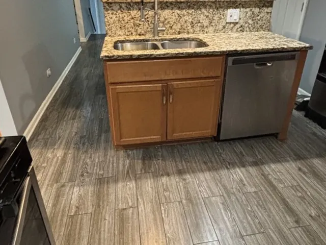 a utility room with washer and dryer