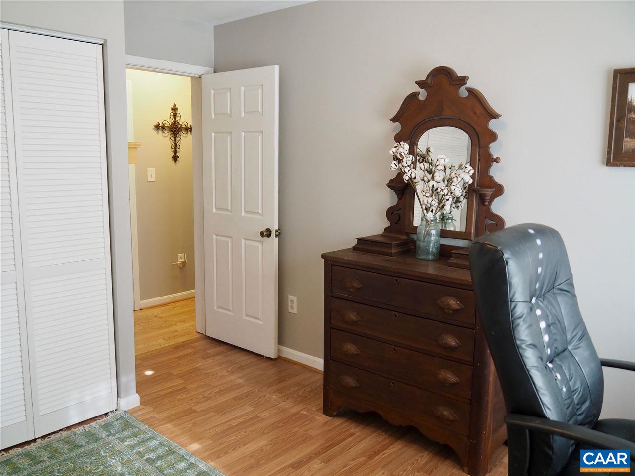 2880 Craigland Road Charlottesville, VA 22902 - Photo 29 of 48 a view of a hallway with entryway wooden floor and front door