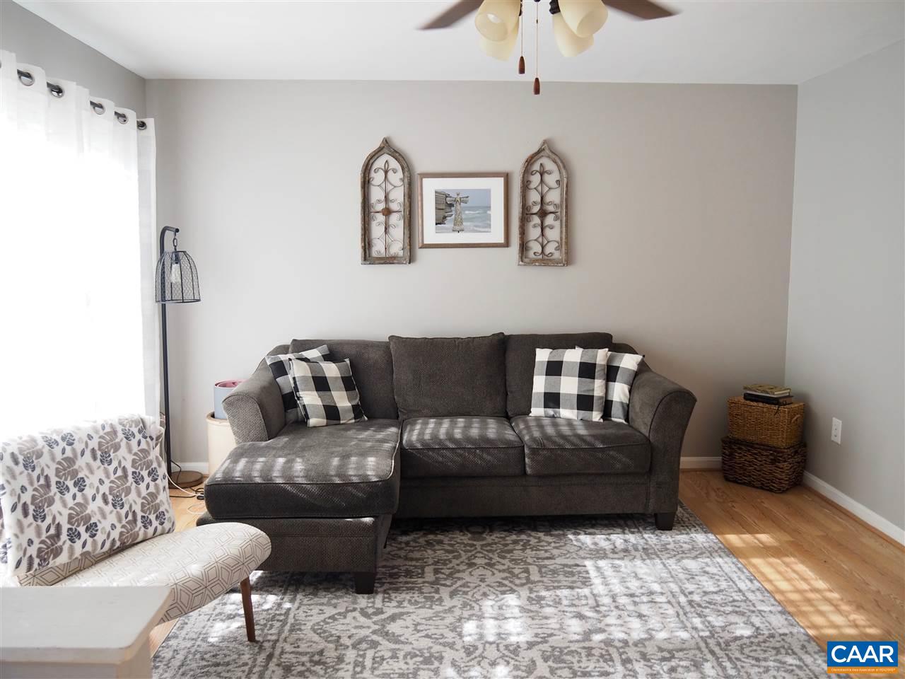2880 Craigland Road Charlottesville, VA 22902 - Photo 3 of 48 a living room with furniture and a couch