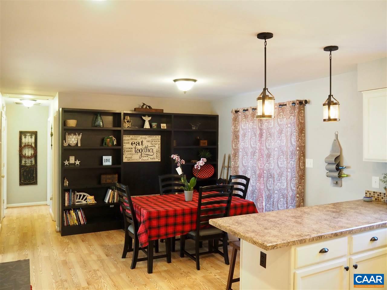 2880 Craigland Road Charlottesville, VA 22902 - Photo 8 of 48 a view of a dining room with furniture