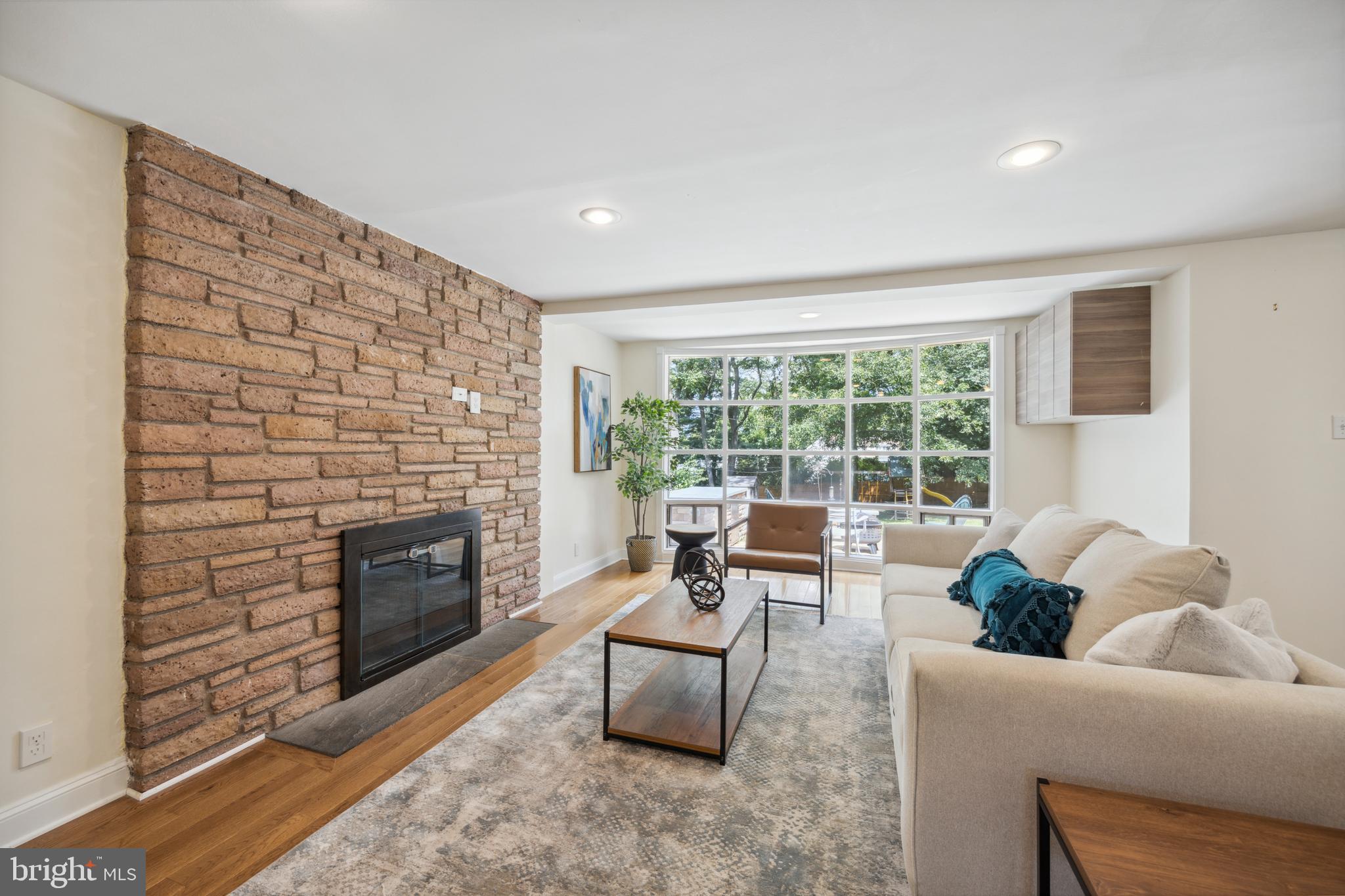 709 Oxford Road Bala Cynwyd, PA 19004 - Photo 8 of 25 First floor open concept living with fireplace