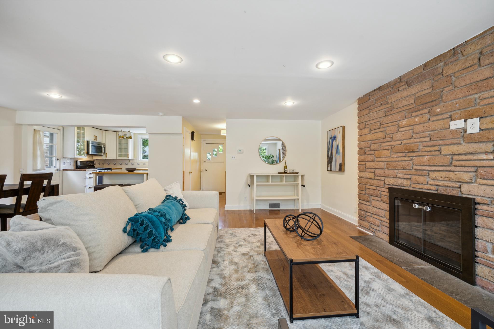 709 Oxford Road Bala Cynwyd, PA 19004 - Photo 9 of 25 First floor open concept living with fireplace